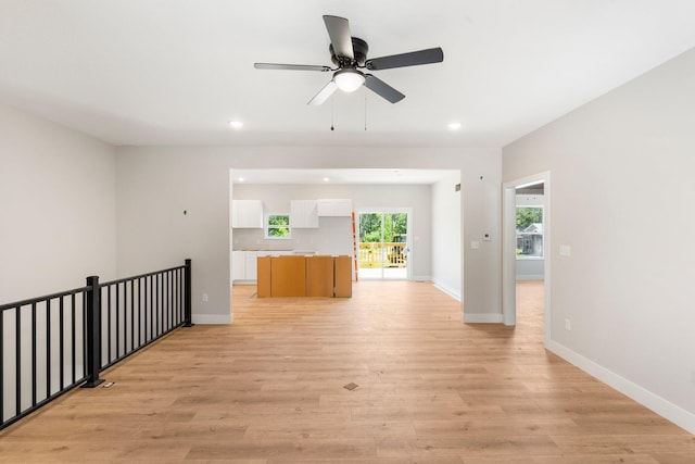 404 Sugarberry Dr, Columbia, MO 65201 - unfurnished living room featuring recessed lighting, ceiling fan, light wood finished floors, and baseboards