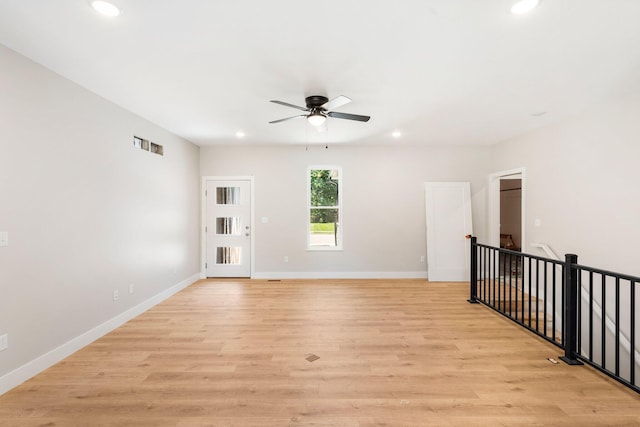 404 Sugarberry Dr, Columbia, MO 65201 - spare room featuring recessed lighting, a ceiling fan, light wood finished floors, and baseboards