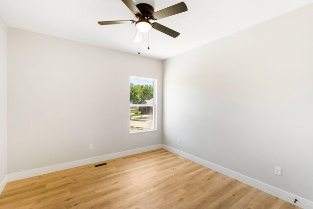 404 Sugarberry Dr, Columbia, MO 65201 - unfurnished room featuring light wood-style flooring, baseboards, and a ceiling fan