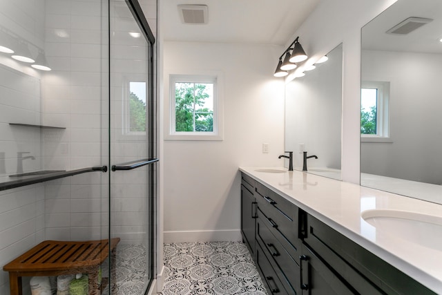210 Hickam Aly, Ashland, MO 65010 - full bath with double vanity, a shower stall, and tile patterned flooring