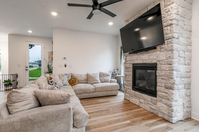 210 Hickam Aly, Ashland, MO 65010 - living room with a ceiling fan, light wood-style floors, a stone fireplace, and recessed lighting