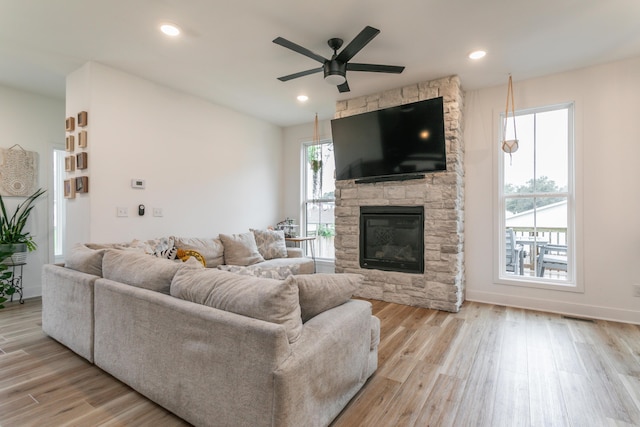 210 Hickam Aly, Ashland, MO 65010 - living room with a ceiling fan, a stone fireplace, wood finished floors, and recessed lighting