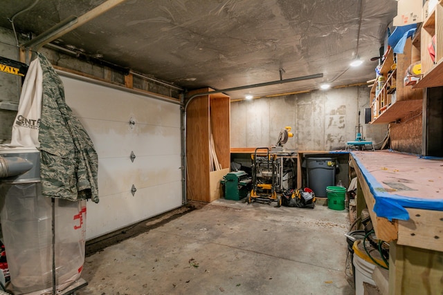 210 Hickam Aly, Ashland, MO 65010 - garage with a workshop area