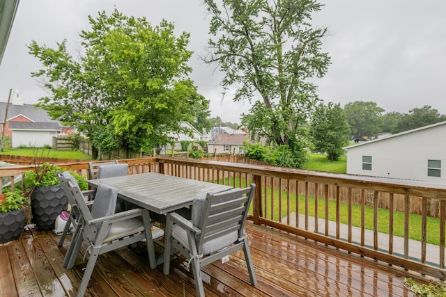 210 Hickam Aly, Ashland, MO 65010 - wooden terrace featuring outdoor dining area and a fenced backyard