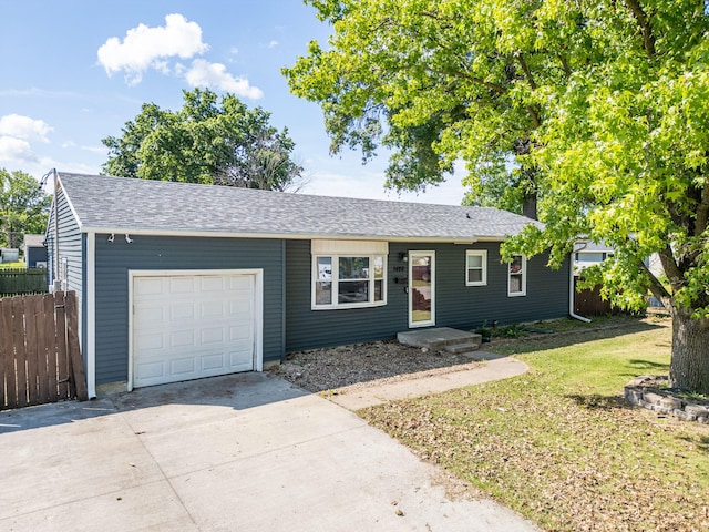 1420 Sherwood Rd, Mexico, MO 65265 - ranch-style house featuring a garage, driveway, and roof with shingles