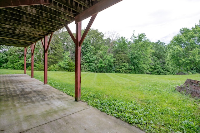 1820 N Hemlock Ridge Rd, Rocheport, MO 65279 - view of green lawn with a patio