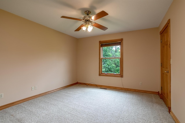 1820 N Hemlock Ridge Rd, Rocheport, MO 65279 - empty room with light carpet, a ceiling fan, and baseboards