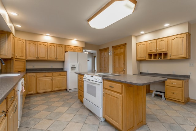 1820 N Hemlock Ridge Rd, Rocheport, MO 65279 - kitchen featuring white appliances, a sink, dark countertops, recessed lighting, and light tile patterned floors