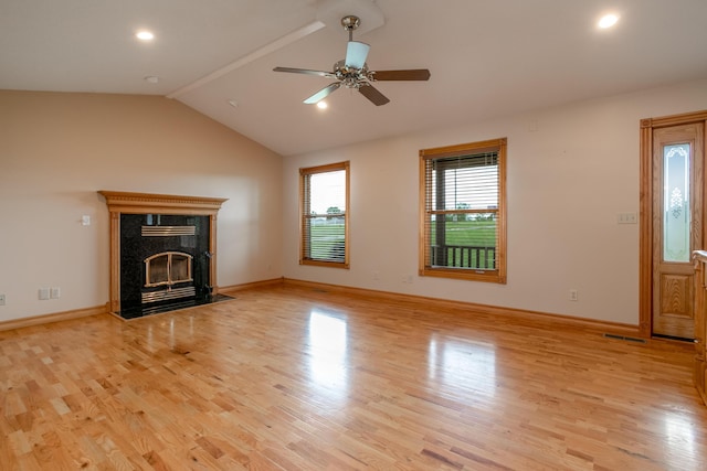1820 N Hemlock Ridge Rd, Rocheport, MO 65279 - unfurnished living room with a ceiling fan, light wood-style floors, lofted ceiling, a high end fireplace, and baseboards