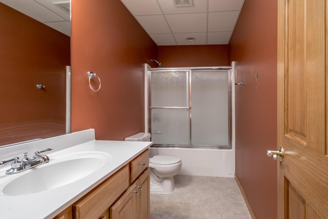 1820 N Hemlock Ridge Rd, Rocheport, MO 65279 - bathroom featuring vanity, a drop ceiling, toilet, and shower / bath combination with glass door
