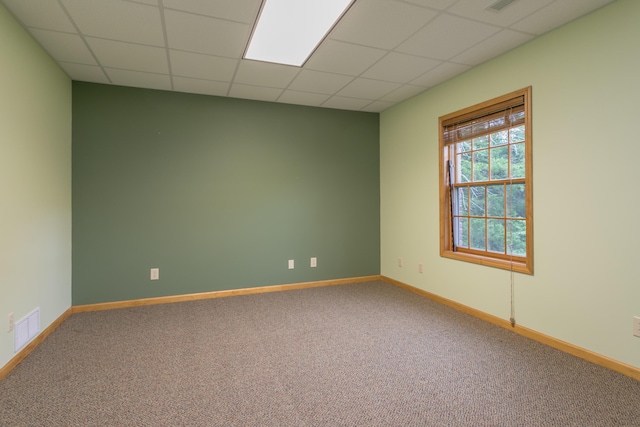 1820 N Hemlock Ridge Rd, Rocheport, MO 65279 - empty room with carpet, baseboards, and a drop ceiling
