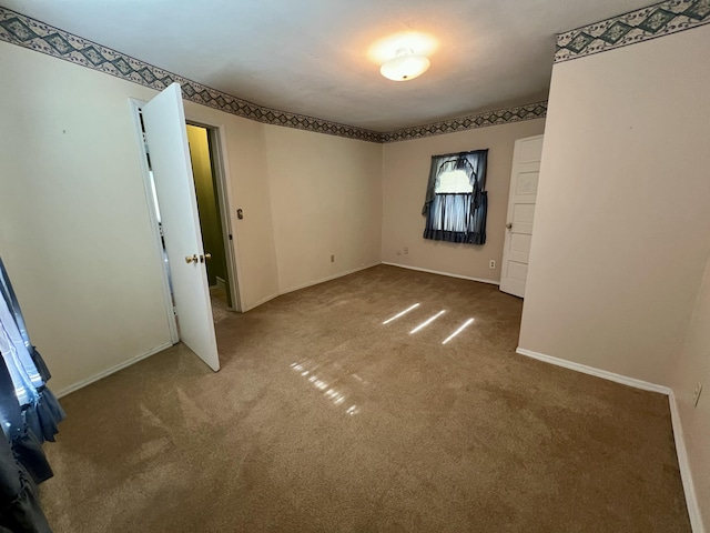 112 W 6th St, Fulton, MO 65251 - empty room with carpet floors and baseboards