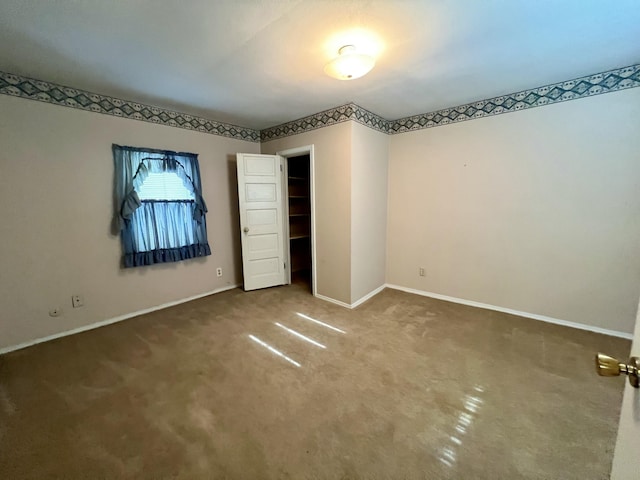 112 W 6th St, Fulton, MO 65251 - unfurnished bedroom with carpet flooring and baseboards