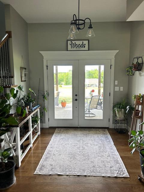 15172 S Henry Ln, Ashland, MO 65010 - entrance foyer featuring plenty of natural light, french doors, and wood finished floors