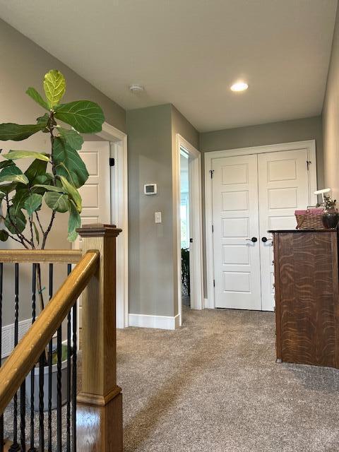 15172 S Henry Ln, Ashland, MO 65010 - corridor featuring carpet flooring, baseboards, an upstairs landing, and recessed lighting