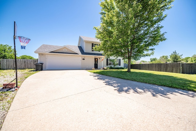170 E Crest Ct, Columbia, MO 65202 - view of front of home with an attached garage, driveway, and roof with shingles