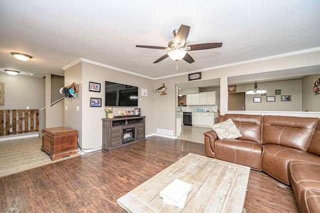 170 E Crest Ct, Columbia, MO 65202 - living room with crown molding, a ceiling fan, a glass covered fireplace, wood finished floors, and baseboards