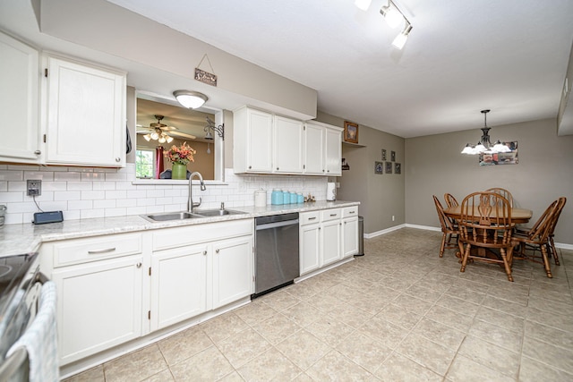 170 E Crest Ct, Columbia, MO 65202 - kitchen with stainless steel appliances, a sink, decorative backsplash, baseboards, and white cabinets