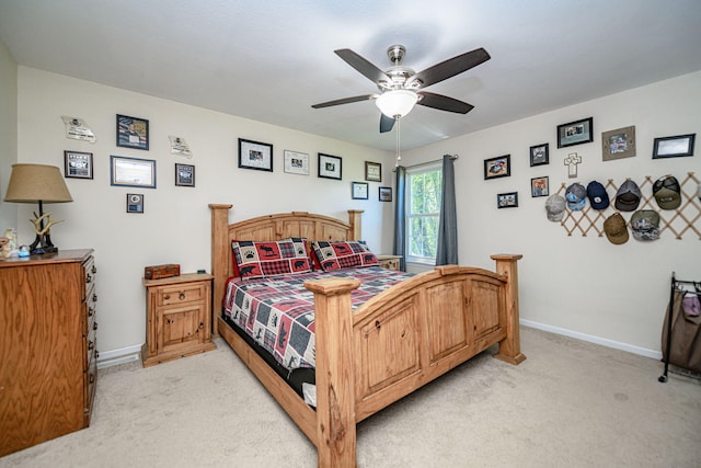 170 E Crest Ct, Columbia, MO 65202 - bedroom featuring light carpet, baseboards, and a ceiling fan
