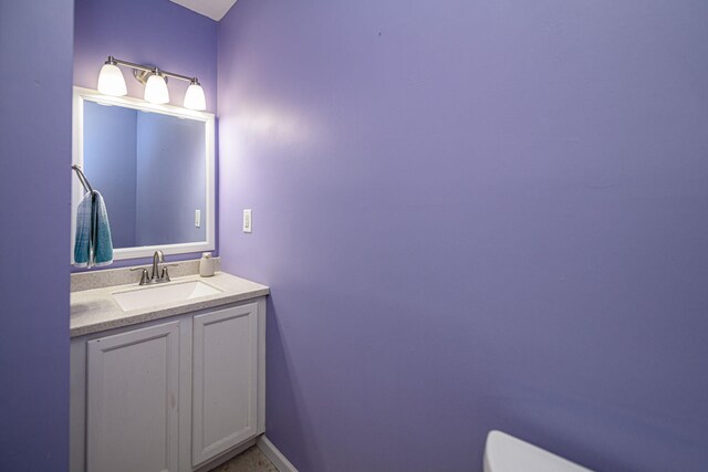 170 E Crest Ct, Columbia, MO 65202 - half bath with vanity, toilet, and baseboards