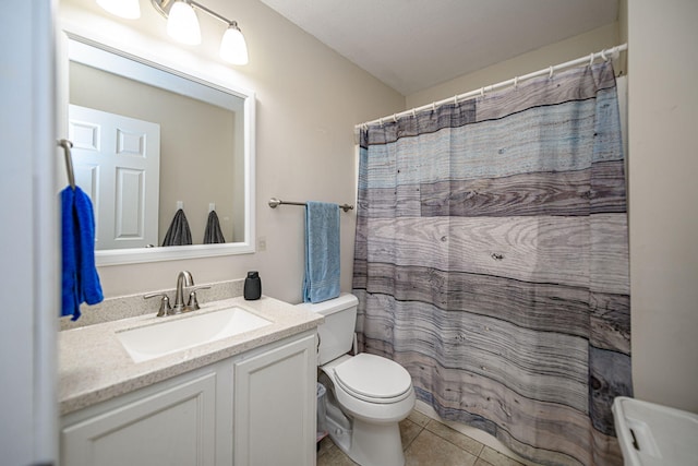 170 E Crest Ct, Columbia, MO 65202 - full bath featuring toilet, vanity, and tile patterned flooring