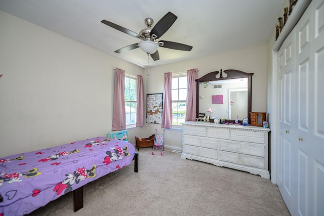 170 E Crest Ct, Columbia, MO 65202 - carpeted bedroom with a closet and ceiling fan