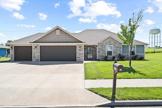 15620 Allegiance Ave, Ashland, MO 65010 - view of front of house with a garage, driveway, a front yard, and stone siding