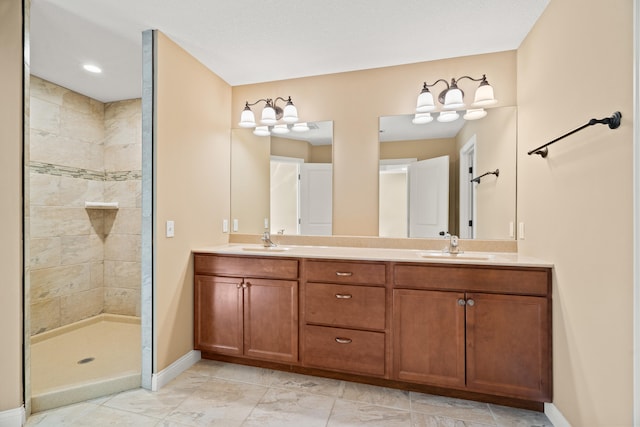 15620 Allegiance Ave, Ashland, MO 65010 - bathroom with baseboards, double vanity, and a tile shower