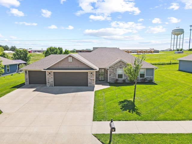 15620 Allegiance Ave, Ashland, MO 65010 - view of front facade featuring stone siding, an attached garage, a front yard, driveway, and roof with shingles
