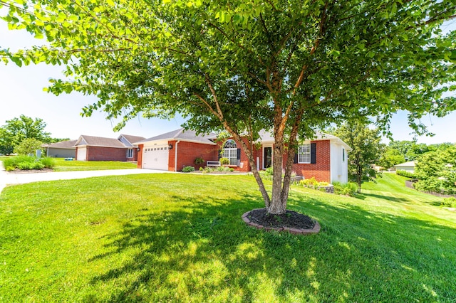 2803 Wooded Creek Dr, Columbia, MO 65203 - ranch-style home with driveway, brick siding, a garage, and a front yard