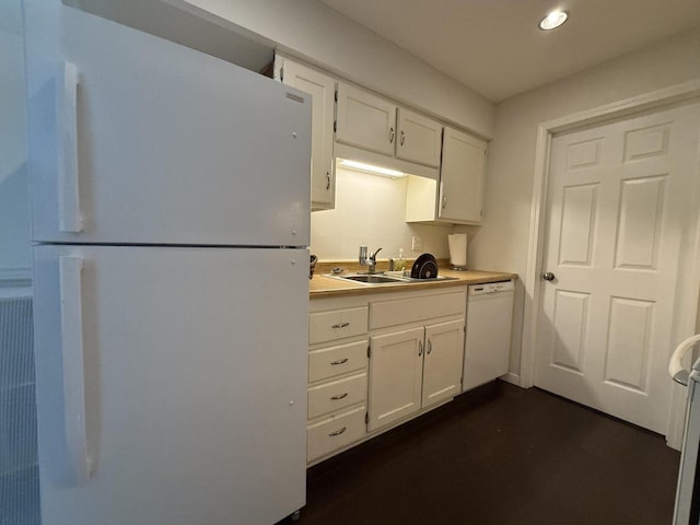 1999 N Waterfront Dr Unit H, Columbia, MO 65202 - kitchen with white appliances, a sink, white cabinetry, recessed lighting, and light countertops