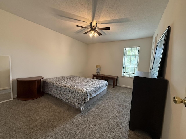 1999 N Waterfront Dr Unit H, Columbia, MO 65202 - carpeted bedroom featuring a textured ceiling, ceiling fan, and baseboards