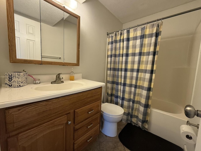 1999 N Waterfront Dr Unit H, Columbia, MO 65202 - full bathroom with toilet, vanity, tile patterned floors, shower / bath combo with shower curtain, and a textured ceiling