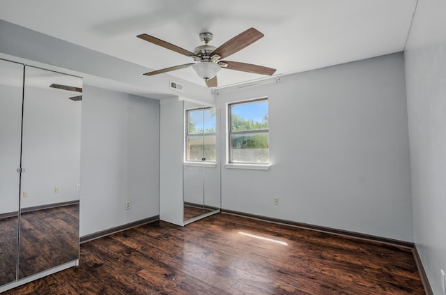 509 Columbia Dr Unit B, Columbia, MO 65201 - empty room featuring wood finished floors, a ceiling fan, and baseboards