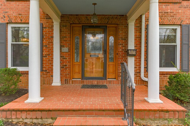 404 S Greenwood Ave, Columbia, MO 65203 - property entrance featuring brick siding and a porch