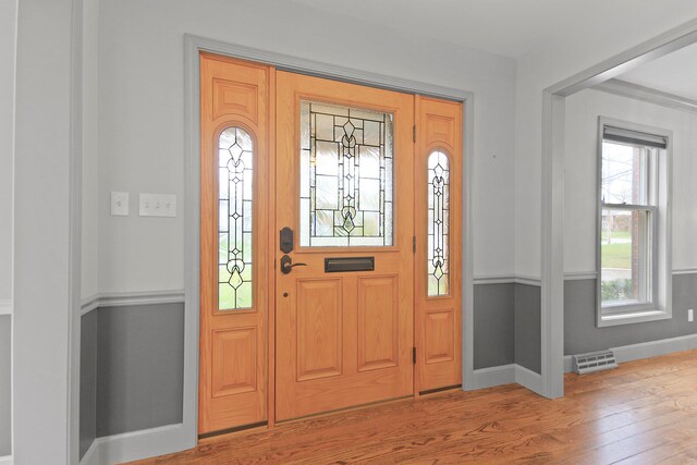 404 S Greenwood Ave, Columbia, MO 65203 - foyer entrance featuring wood finished floors and baseboards