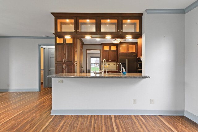 404 S Greenwood Ave, Columbia, MO 65203 - kitchen featuring high quality fridge, dark wood finished floors, baseboards, and crown molding