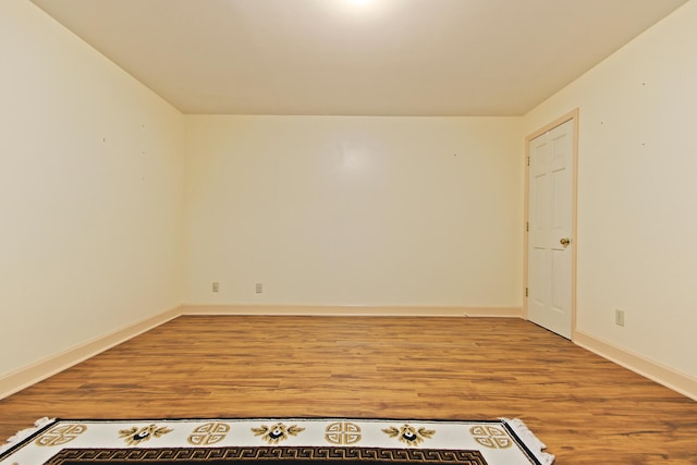 404 S Greenwood Ave, Columbia, MO 65203 - empty room featuring wood finished floors and baseboards