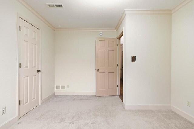 404 S Greenwood Ave, Columbia, MO 65203 - carpeted spare room featuring crown molding and baseboards