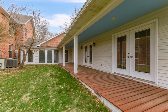 404 S Greenwood Ave, Columbia, MO 65203 - view of grassy yard with french doors, cooling unit, and a wooden deck