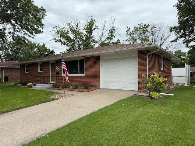 1609 Doris Dr, Columbia, MO 65202 - single story home featuring brick siding, an attached garage, and driveway