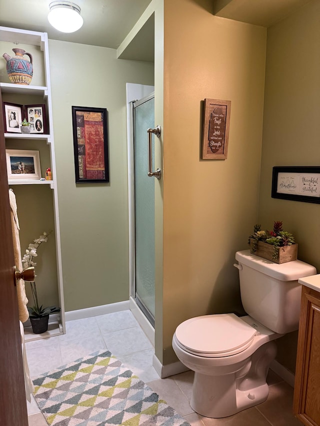 1609 Doris Dr, Columbia, MO 65202 - full bath featuring tile patterned flooring, toilet, and a shower stall