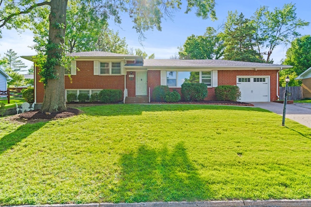 368 Crown Pt, Columbia, MO 65203 - split level home featuring a garage, concrete driveway, and brick siding