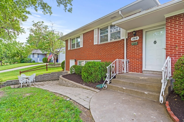 368 Crown Pt, Columbia, MO 65203 - property entrance featuring brick siding and a yard