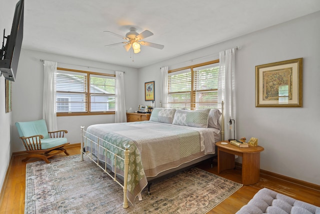 368 Crown Pt, Columbia, MO 65203 - bedroom featuring wood finished floors, baseboards, and a ceiling fan