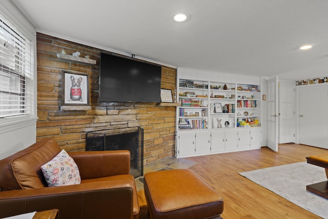368 Crown Pt, Columbia, MO 65203 - living area with a stone fireplace, light wood-style flooring, and recessed lighting
