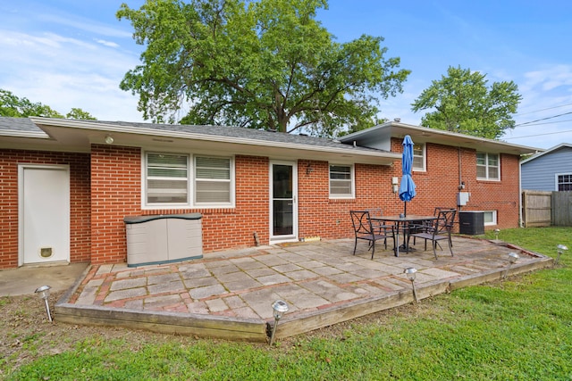 368 Crown Pt, Columbia, MO 65203 - back of house with brick siding, a patio area, and central air condition unit
