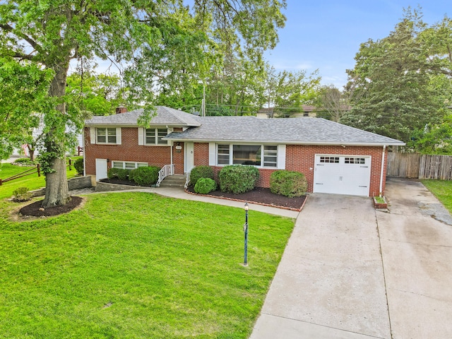 368 Crown Pt, Columbia, MO 65203 - split level home featuring a chimney, a garage, brick siding, and concrete driveway