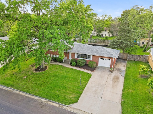 368 Crown Pt, Columbia, MO 65203 - view of front facade with a garage, brick siding, and concrete driveway