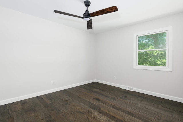 1152 E Bluebird Ln, Columbia, MO 65201 - spare room featuring baseboards, dark wood finished floors, and ceiling fan